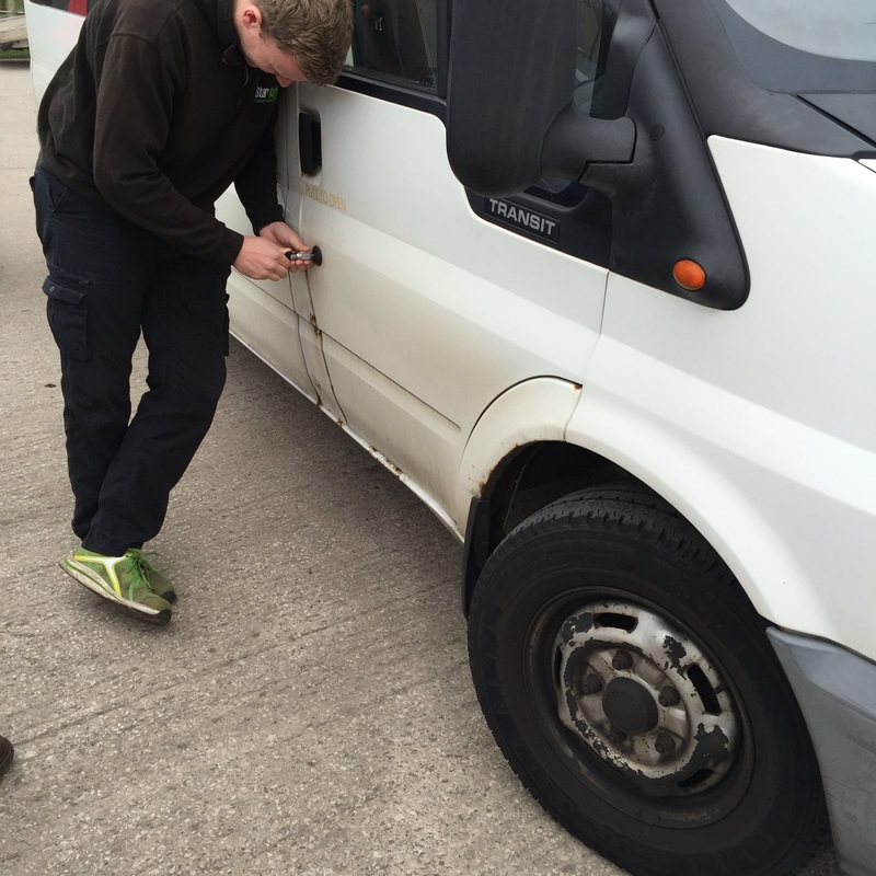 Phil working hard - Damage free entry to a van